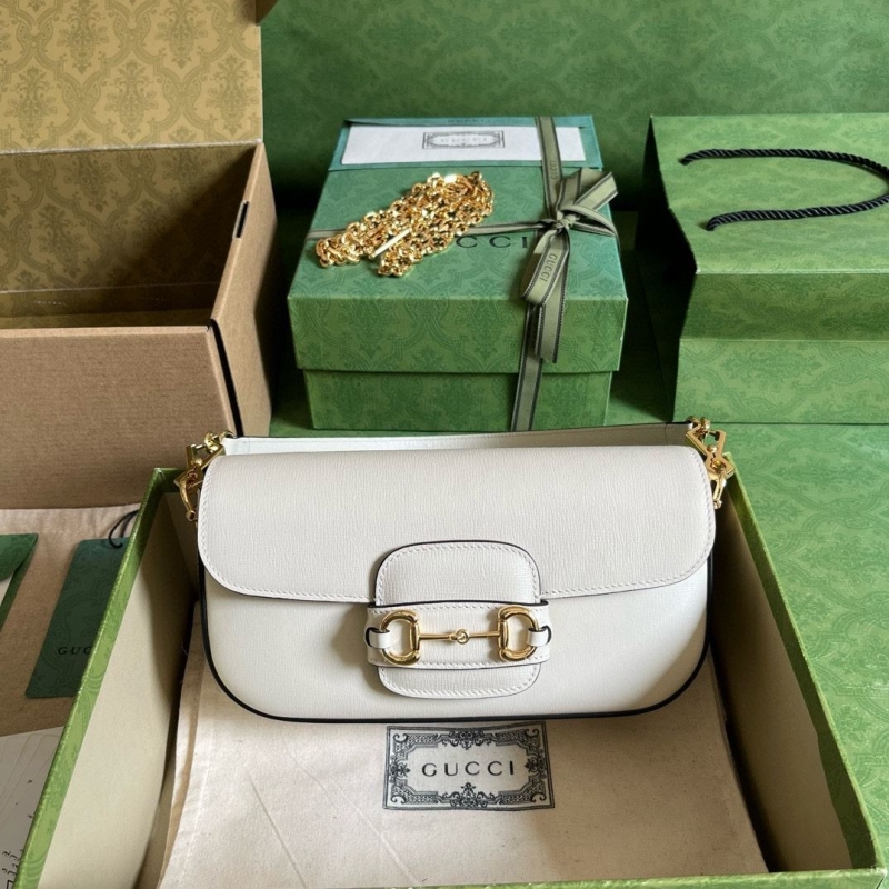 G*u*i satchel bags